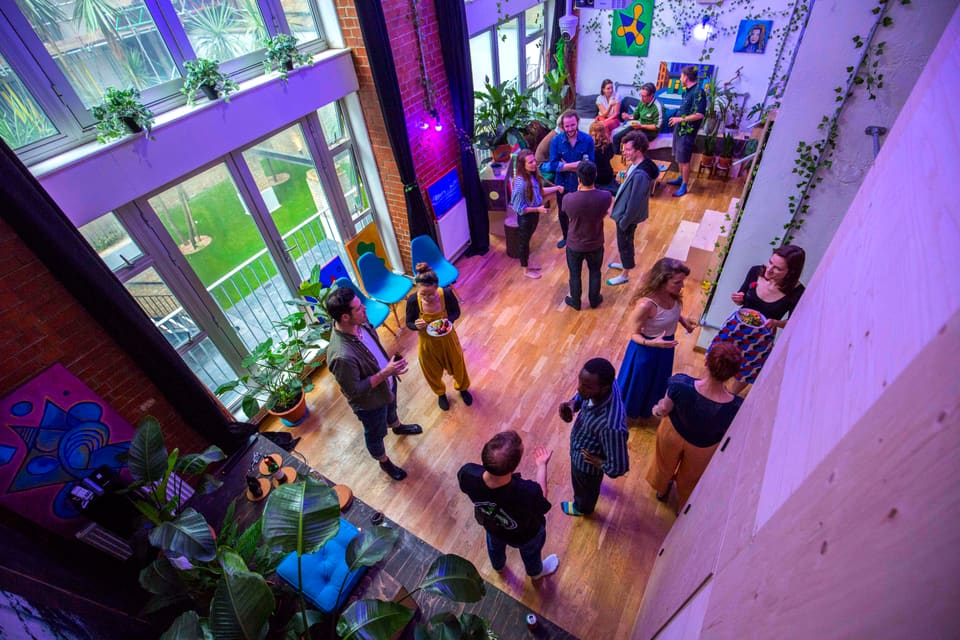 Guests standing and talking during a drinks reception