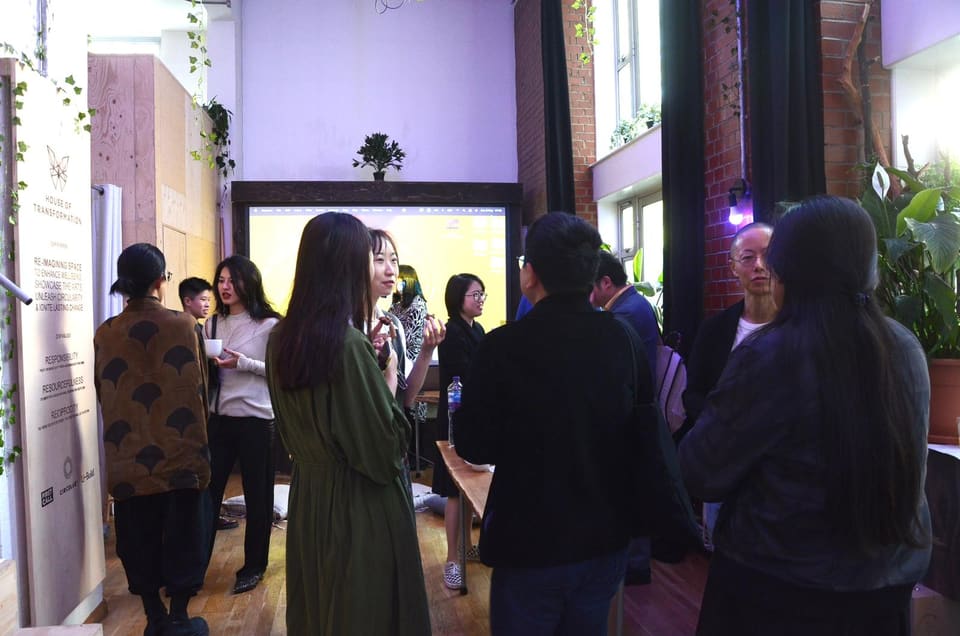 Guests talking during a networking event in the main room